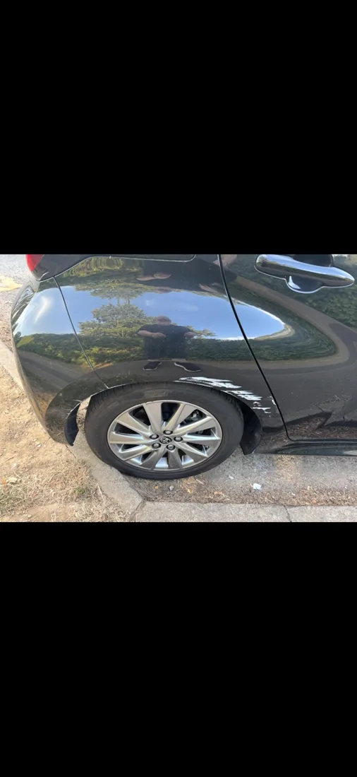 Toyota — wheel-arch scuff repair: before